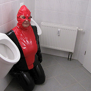 Anna as a toilet in latex ... gallery image