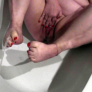 Naked hot golden shower on soles and pussy pissed on gallery image