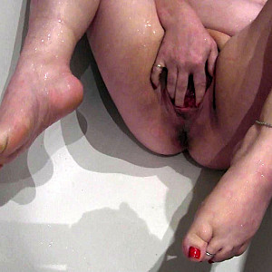 Naked hot golden shower on soles and pussy pissed on gallery image