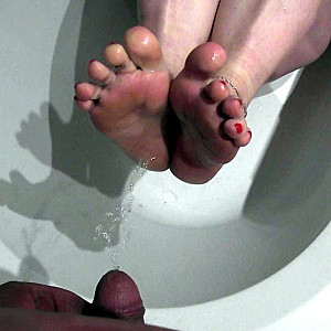 Naked hot golden shower on soles and pussy pissed on gallery image