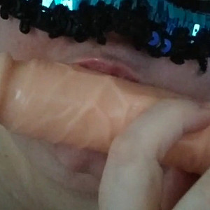 Sucking on a dildo2 gallery image