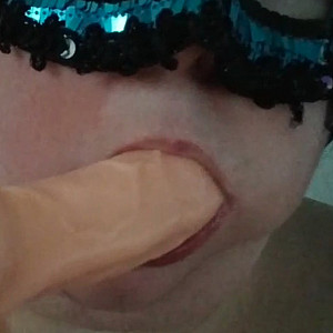 Sucking on a dildo2 gallery image