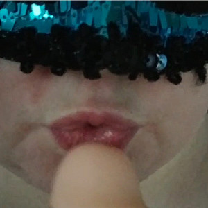 Sucking on a dildo gallery image