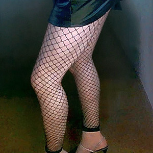 Sabine96 in a mini dress and pom-pom heels gallery image