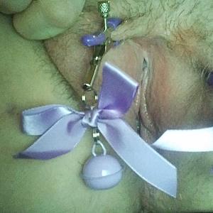 First image of WishGirl's Gallery - Purple nipple clamps on her pussy