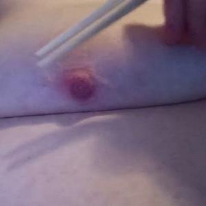 First Image Of WishGirl's Video - Hard nipples between chopsticks