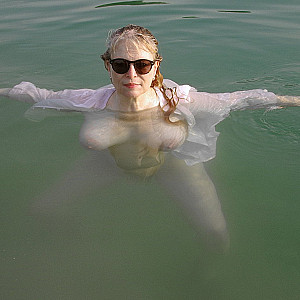 White blouse in the quarry pond gallery image