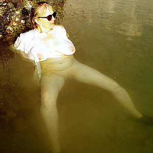 White blouse in the quarry pond gallery image