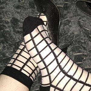 black sexy high heels and fishnet stockings gallery image