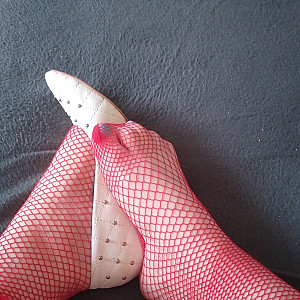 White high heels and red fishnet stockings gallery image
