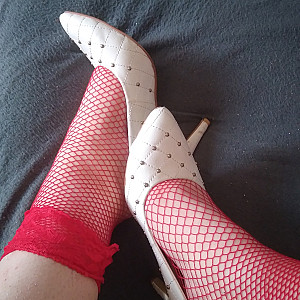 White high heels and red fishnet stockings gallery image