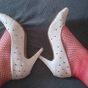 White high heels and red fishnet stockings gallery image