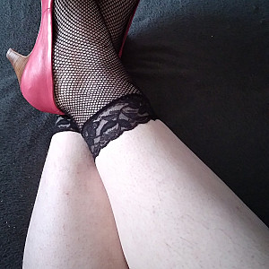 Pink heels and black ankle socks gallery image