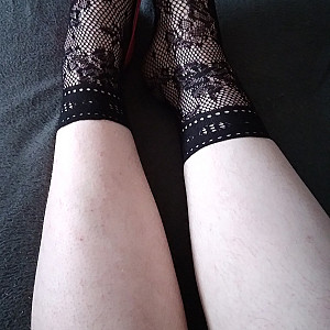 Pink heels and black ankle socks gallery image