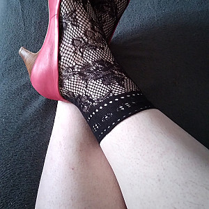 Pink heels and black ankle socks gallery image
