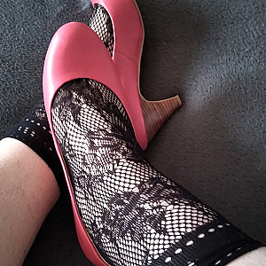 Pink heels and black ankle socks gallery image