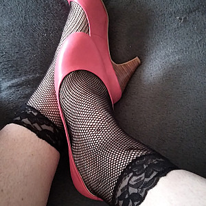 Pink heels and black ankle socks gallery image