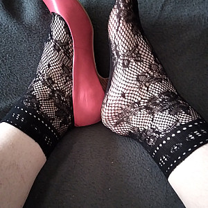Pink heels and black ankle socks gallery image
