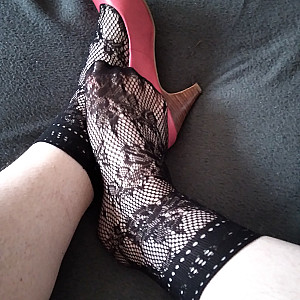 Pink heels and black ankle socks gallery image