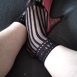 Pink heels and black ankle socks gallery image