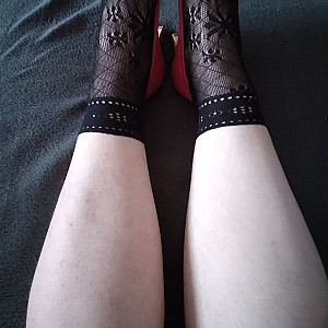 Pink heels and black ankle socks gallery image
