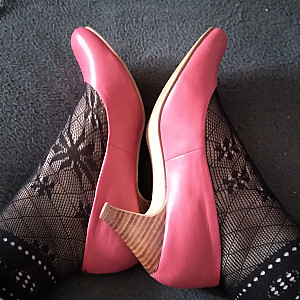 Pink heels and black ankle socks gallery image
